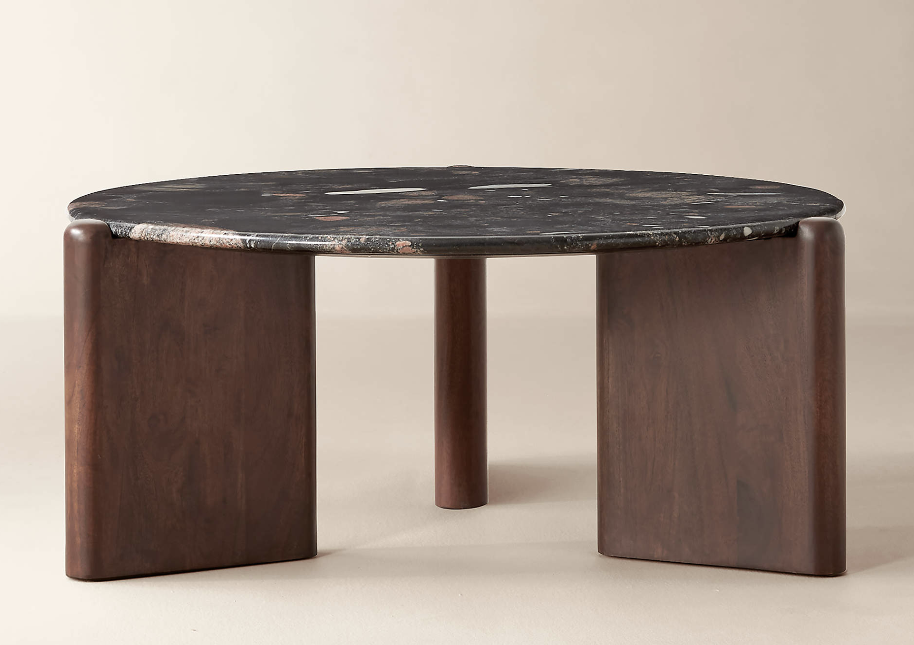 CB2 black marble coffee table